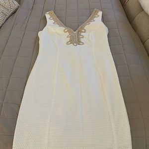 Bought but never worn. No tags. Lilly Pulitzer dress size 4 white and gold